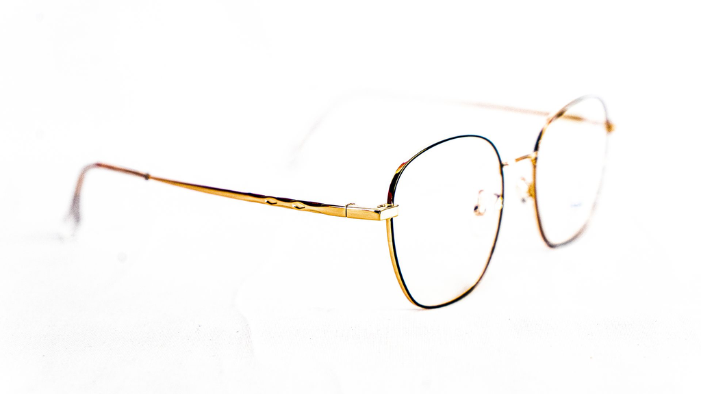 Monture dorée et noire Titanium – Dakar VDN