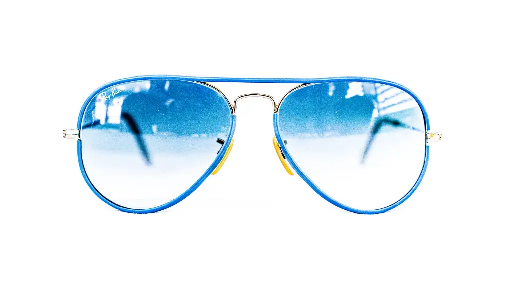 Lunette de soleil Ray-Ban bleu et doré élégante – Luxe Optique Dakar