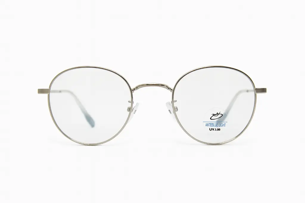 Lunettes métal rondes Titanium homme – Luxe Optique VDN Dakar.webp