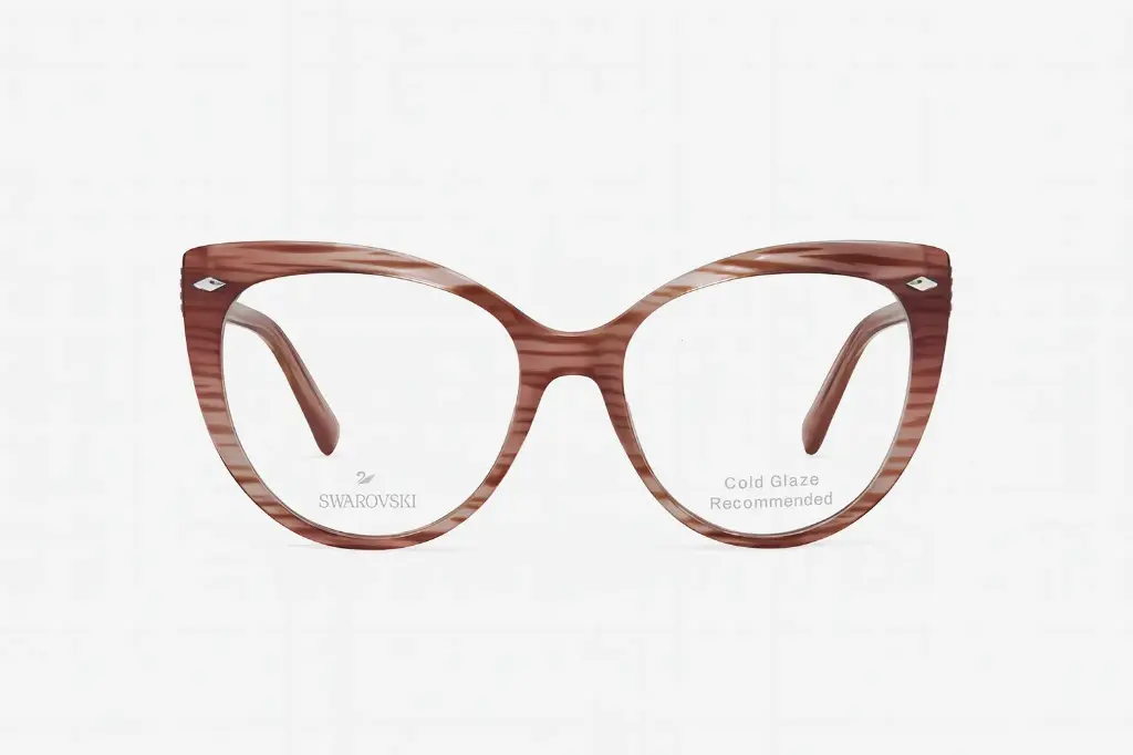 Monture marron pour femme Swarovski – Luxe Optique Dakar.webp